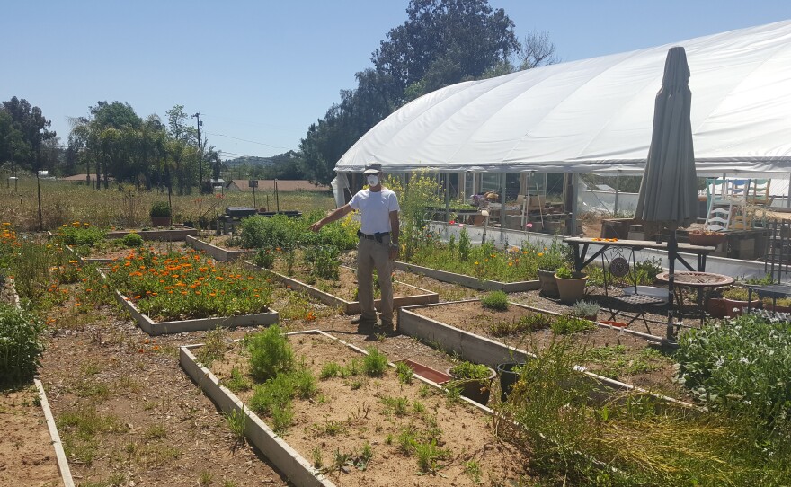 Joe Zenovic, manager of San Diego Organic Farms, overseeing fresh organic produce at the Ramona farm stand